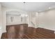 Dining room features hardwood floors and archway to a cozy living space at 159 Terracina Circle, Myrtle Beach, SC 29588