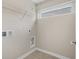 The laundry room includes hookups for a washer and dryer and wire shelving at 159 Terracina Circle, Myrtle Beach, SC 29588