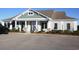 Attractive clubhouse exterior with stone accents, well-manicured landscaping, and convenient parking at 161 Copper Leaf Dr., Myrtle Beach, SC 29588