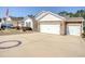 Charming single-story home featuring a spacious driveway and attached two-car garage at 161 Copper Leaf Dr., Myrtle Beach, SC 29588