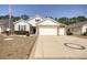 Charming single-story home featuring a spacious driveway and attached two-car garage at 161 Copper Leaf Dr., Myrtle Beach, SC 29588