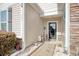 Inviting front porch with charming decor, stylish accents, and a welcoming entrance at 161 Copper Leaf Dr., Myrtle Beach, SC 29588