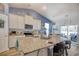 Open-concept kitchen with granite countertops, stainless steel appliances, and a large island at 161 Copper Leaf Dr., Myrtle Beach, SC 29588