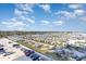 Expansive aerial view of a beachfront RV resort under a blue sky with scattered clouds at 161 Seawatch Dr. # 808, Myrtle Beach, SC 29572