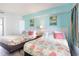 Comfortable bedroom featuring two beds with decorative pillows, complemented by serene decor and wall art at 161 Seawatch Dr. # 808, Myrtle Beach, SC 29572