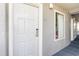 A well-lit entrance to the unit with a digital lock and view to the interior through the small window at 161 Seawatch Dr. # 808, Myrtle Beach, SC 29572
