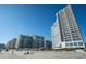 Beautiful condo complex featuring multiple units with balconies, with beach access at 161 Seawatch Dr. # 808, Myrtle Beach, SC 29572