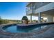 A relaxing lazy river feature with clear, inviting water, surrounded by lush landscaping and coastal charm at 161 Seawatch Dr. # 808, Myrtle Beach, SC 29572