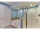This stylish bathroom features a soaking tub with tile surround and a glass-enclosed shower at 1625 S Ocean Blvd. # 802, North Myrtle Beach, SC 29582