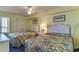 Bedroom with two beds, closet space, and natural light from the window at 1625 S Ocean Blvd. # 802, North Myrtle Beach, SC 29582