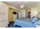 This comfortable bedroom offers stylish furniture, a ceiling fan, and access to other areas of the home at 1625 S Ocean Blvd. # 802, North Myrtle Beach, SC 29582