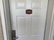 Unit N802 is marked by a standard white door with a simple door knob at 1625 S Ocean Blvd. # 802, North Myrtle Beach, SC 29582