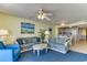 Living room adjacent to the kitchen with ceiling fans at 1625 S Ocean Blvd. # 802, North Myrtle Beach, SC 29582