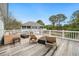 A spacious deck with outdoor furniture offers a comfortable seating area with great views of the neighborhood at 165 Marsh Lake Dr. # 27, Georgetown, SC 29440