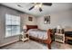 This bedroom features a bed, two nightstands, and a window with blinds at 177 Tibton Circle, Myrtle Beach, SC 29588