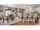 Open dining area with stylish bar seating, kitchen views, and natural light at 177 Tibton Circle, Myrtle Beach, SC 29588