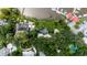 Aerial of coastal home with private pool and lush landscaping and nearby waterway at 201 River Rd., Georgetown, SC 29440