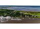 Scenic aerial view of marina and harbor with water access and lush surroundings at 201 River Rd., Georgetown, SC 29440