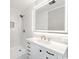 Modern bathroom featuring a large illuminated mirror and white subway tile shower at 201 River Rd., Georgetown, SC 29440
