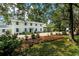 Charming two-story home with blue shutters and mature landscaping at 201 River Rd., Georgetown, SC 29440