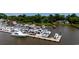 Dockside view of a marina with various boats moored at the slips at 201 River Rd., Georgetown, SC 29440