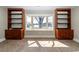 Sitting area with bay window, water view, and built-in bookcases at 201 River Rd., Georgetown, SC 29440