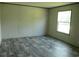 Bedroom featuring a window and neutral walls, creating a serene and comfortable atmosphere at 2016 Misty Morning Dr., Conway, SC 29527