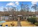This home boasts a manicured lawn and direct access to the river with a private dock and covered area at 208 Wahee Pl., Conway, SC 29527