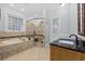 Bright bathroom featuring a soaking tub, tiled shower, and vanity with black countertop at 208 Wahee Pl., Conway, SC 29527