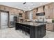 Gourmet kitchen with large island, stainless steel appliances, and custom cabinetry at 208 Wahee Pl., Conway, SC 29527
