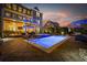 Enjoy the evening in this backyard with a swimming pool, lounge chairs, and a covered seating area at 208 Wahee Pl., Conway, SC 29527