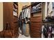 Well-organized walk-in closet with custom shelving, drawers, and ample hanging space at 208 Wahee Pl., Conway, SC 29527