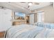 Comfortable bedroom featuring two beds, ceiling fan, and flat screen TV at 2151 Bridge View Ct. # 1-1103, North Myrtle Beach, SC 29582