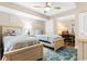 Comfortable bedroom featuring two beds, a desk, nautical themed decorations, and a bright window at 2151 Bridge View Ct. # 1-1103, North Myrtle Beach, SC 29582