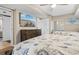 Comfortable bedroom featuring two beds, a dresser with a flat screen television, and neutral decor at 2151 Bridge View Ct. # 1-1103, North Myrtle Beach, SC 29582