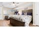 Comfortable bedroom with two beds, ceiling fan, and bright window at 2151 Bridge View Ct. # 1-1103, North Myrtle Beach, SC 29582
