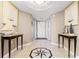 Condo entryway with tiled floors, nautical star design, model sailboat display, and artwork at 2151 Bridge View Ct. # 1-1103, North Myrtle Beach, SC 29582