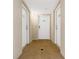 Condo hallway with neutral walls and multiple white doors at 2151 Bridge View Ct. # 1-1103, North Myrtle Beach, SC 29582