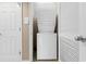 A modern, compact, stacked white washer and dryer unit at 2151 Bridge View Ct. # 1-1103, North Myrtle Beach, SC 29582