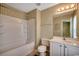Bright bathroom featuring a tub with shower, toilet, and vanity with sink and mirror at 2720 Marengo Ln. # 2720, Conway, SC 29526