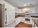 Bright kitchen with white appliances, cabinetry, and modern countertops at 2720 Marengo Ln. # 2720, Conway, SC 29526