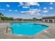 Inviting community pool surrounded by lush landscaping, perfect for relaxation and recreation at 2720 Marengo Ln. # 2720, Conway, SC 29526
