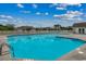 Sparkling community pool surrounded by lush greenery, offering a refreshing retreat at 2720 Marengo Ln. # 2720, Conway, SC 29526