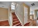 Staircase with wooden steps and white railings at 2720 Marengo Ln. # 2720, Conway, SC 29526