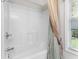 This bathroom boasts a pristine white shower and a stylish shower curtain at 278 Tibton Circle, Myrtle Beach, SC 29588