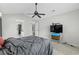 Bedroom with a gray comforter, a fan, and a TV; access to other rooms at 278 Tibton Circle, Myrtle Beach, SC 29588