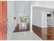 Inviting foyer with hardwood floors, leading to a spacious living area with lake views at 278 Tibton Circle, Myrtle Beach, SC 29588