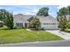 Charming single-Gathering home with a well-manicured lawn and attached two-car garage at 278 Tibton Circle, Myrtle Beach, SC 29588