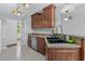 The kitchen features wood cabinets, stainless steel appliances, and stylish pendant lighting at 278 Tibton Circle, Myrtle Beach, SC 29588