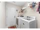 Functional laundry room with modern washer and dryer set, and ample storage at 278 Tibton Circle, Myrtle Beach, SC 29588